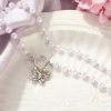 collier-blanc-avec-papillon-3