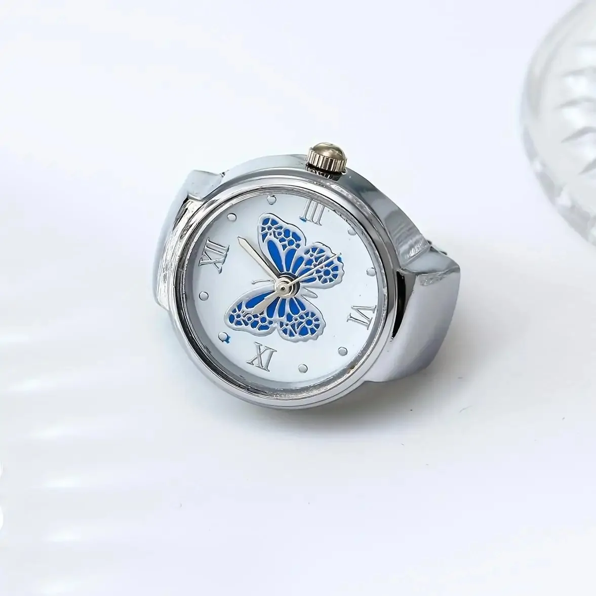 Bague montre papillon, cadran à papillon émaillé, version argente-bleu