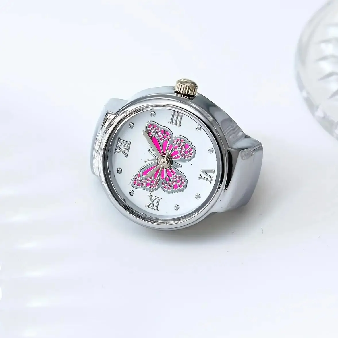 Bague montre papillon, cadran à papillon émaillé, version argente-rose