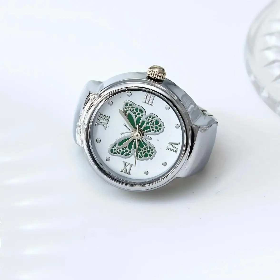 Bague montre papillon, cadran à papillon émaillé, version argente-vert