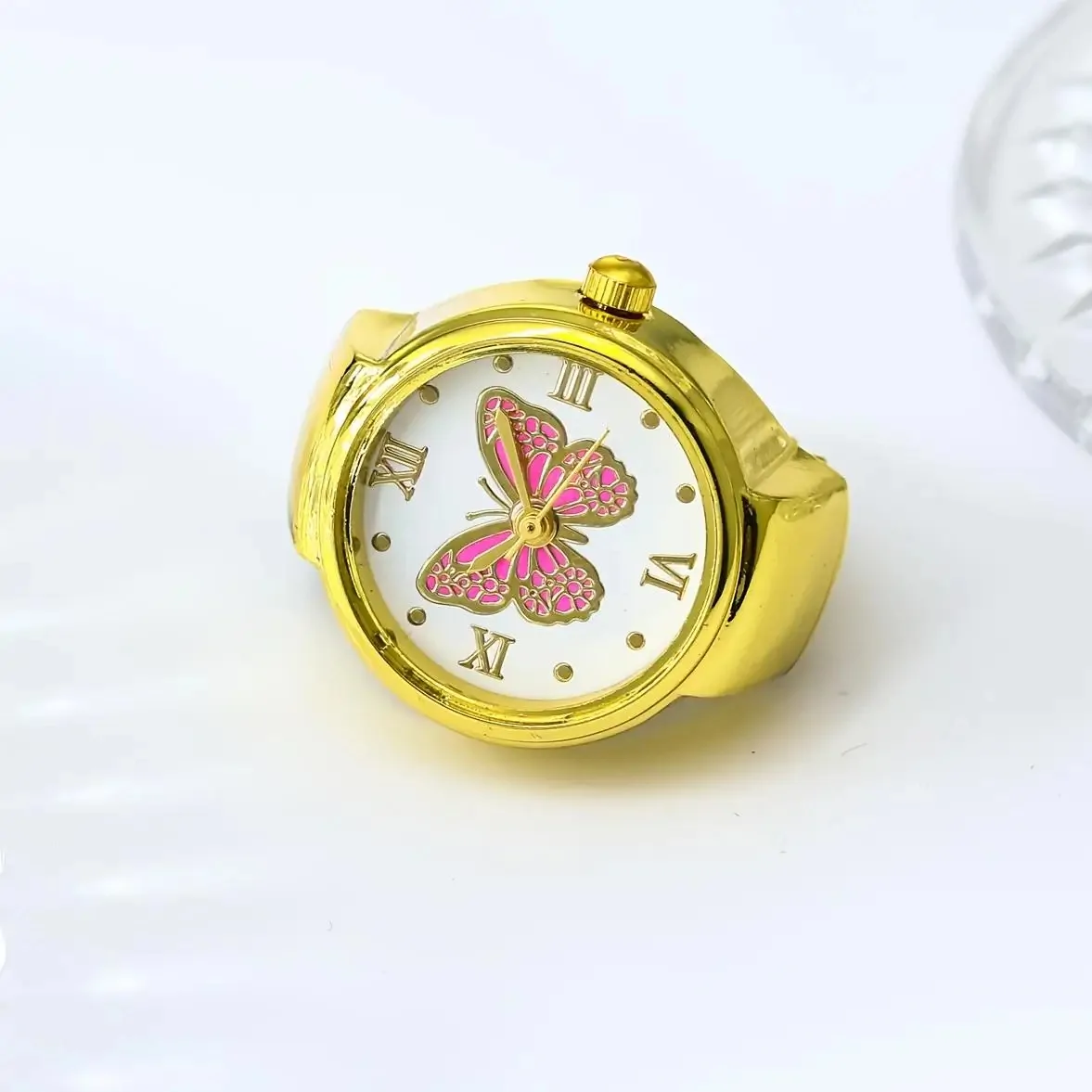 Bague montre papillon, cadran à papillon émaillé, version dore-rose
