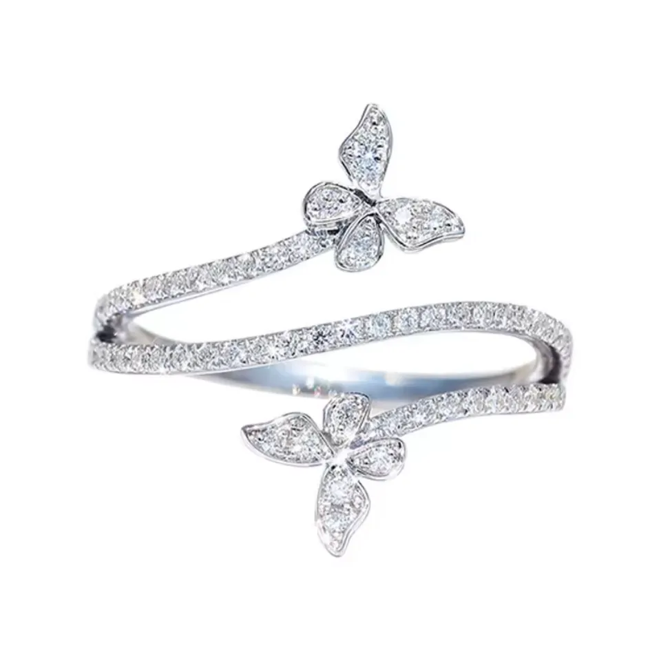 Bague papillon croisée argentée, deux bandes pavées de zircons et deux papillons sertis