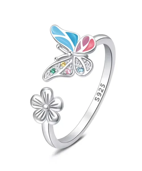 Bague papillon et fleur en argent 925 modèle Résine Pastel, papillon en résine bleu ciel et rose, zircons colorés, face à une fleur en argent