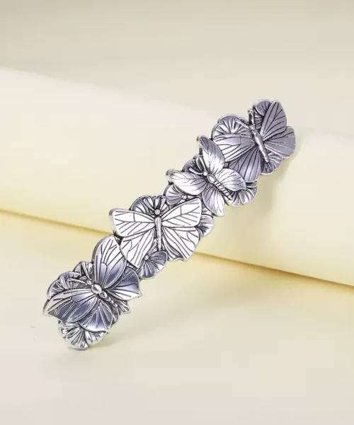 Barrette papillon vintage argent antique, détail des papillons en relief