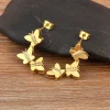 Boucles d'oreilles trois papillons dorés en cascade, corps sertis de zircons