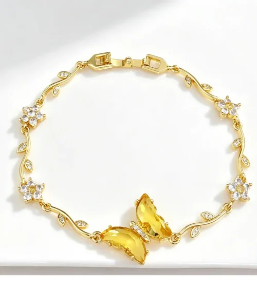 Bracelet papillon cristal jaune, chaîne dorée en branche fleurie