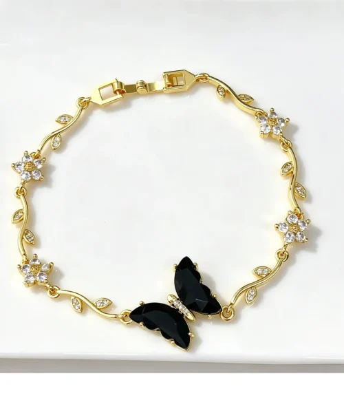 Bracelet papillon cristal noir, chaîne dorée en branche fleurie