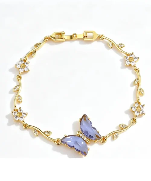 Bracelet papillon cristal violet, chaîne dorée en branche fleurie