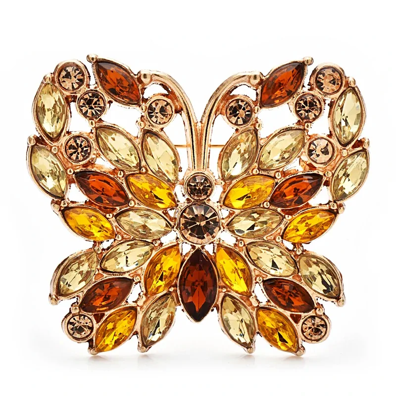 Broche papillon camaïeu ambre, strass navette en rosace sur monture dorée