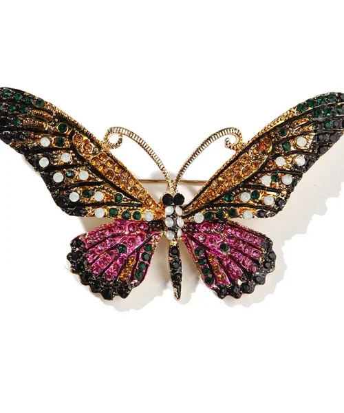 Broche papillon cristal noir et rose, ailes pavées de strass colorés et antennes dorées