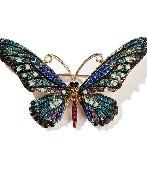 Broche papillon cristal turquoise, ailes pavées de strass colorés et antennes dorées