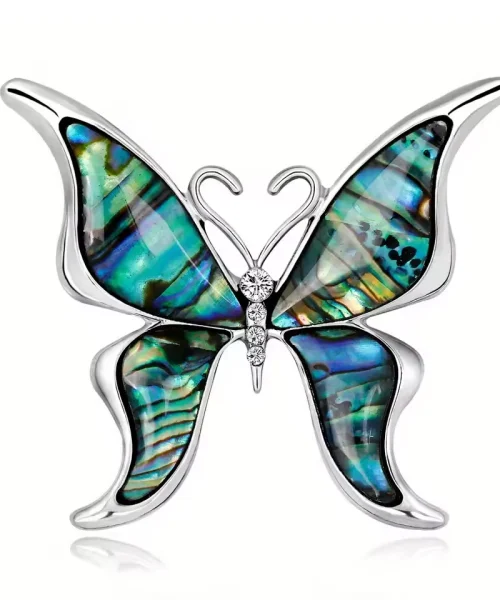 Broche papillon en coquillage naturel irisé bleu et vert, monture argentée