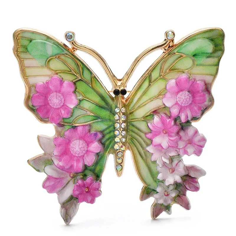 Broche papillon en émail fuchsia, ailes peintes façon vitrail et fleurs en relief