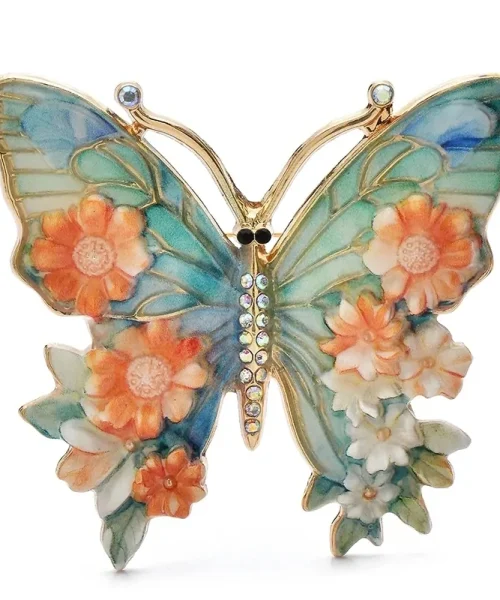 Broche papillon en émail orange, ailes peintes façon vitrail et fleurs en relief