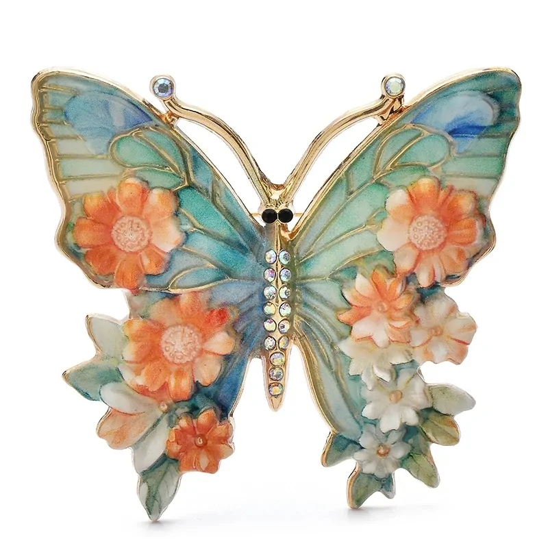 Broche papillon en émail orange, ailes peintes façon vitrail et fleurs en relief