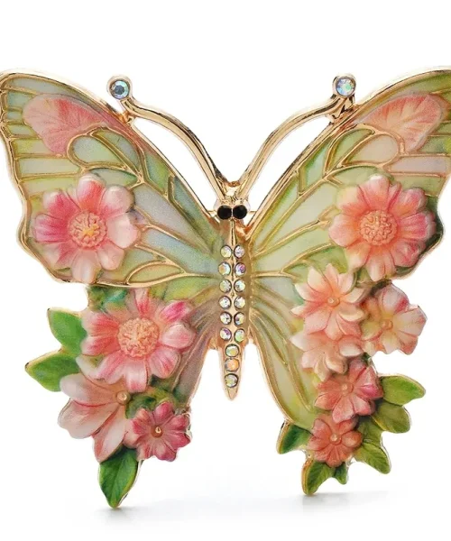 Broche papillon en émail rose, ailes peintes façon vitrail et fleurs en relief