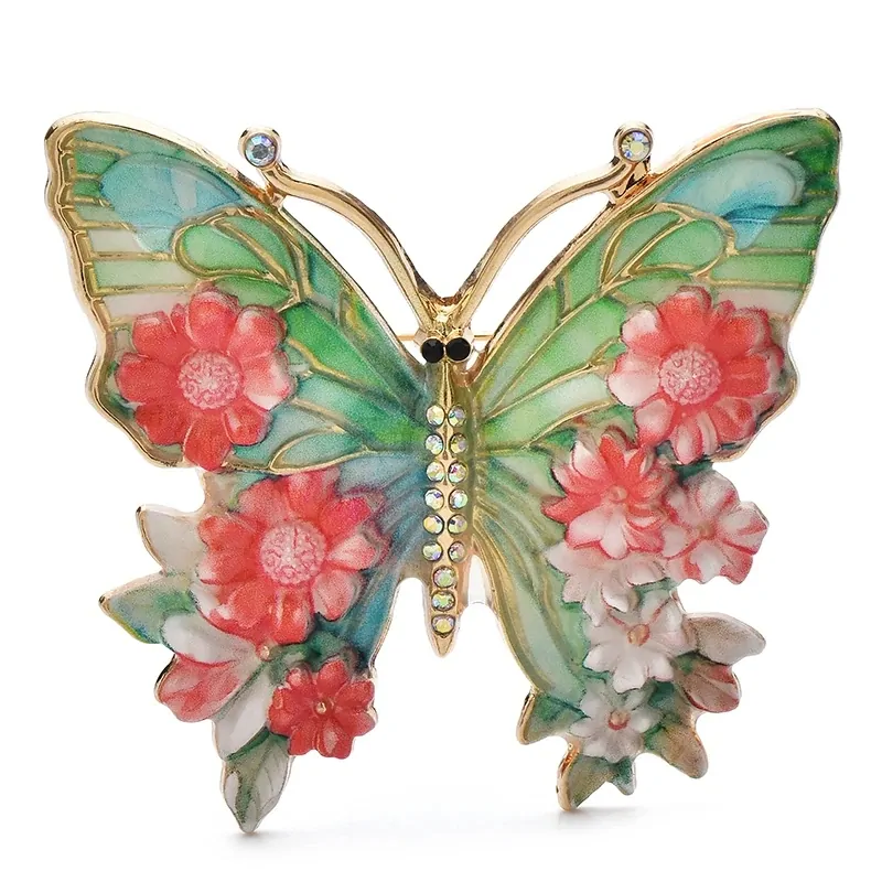 Broche papillon en émail rouge, ailes peintes façon vitrail et fleurs en relief