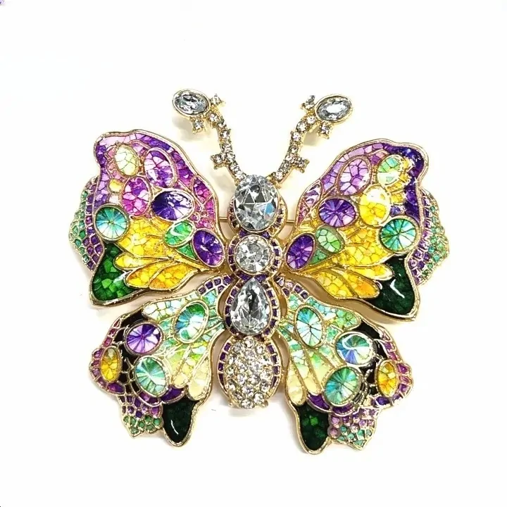 Broche papillon mosaïque violet et jaune, émail irisé et gros cristaux sur monture dorée