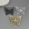Broche papillon note de musique, lot des trois finitions dorée, argentée et noire