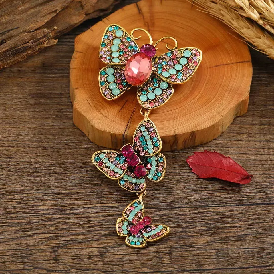 Broche papillon pendante multicolore, trois papillons en strass suspendus en cascade