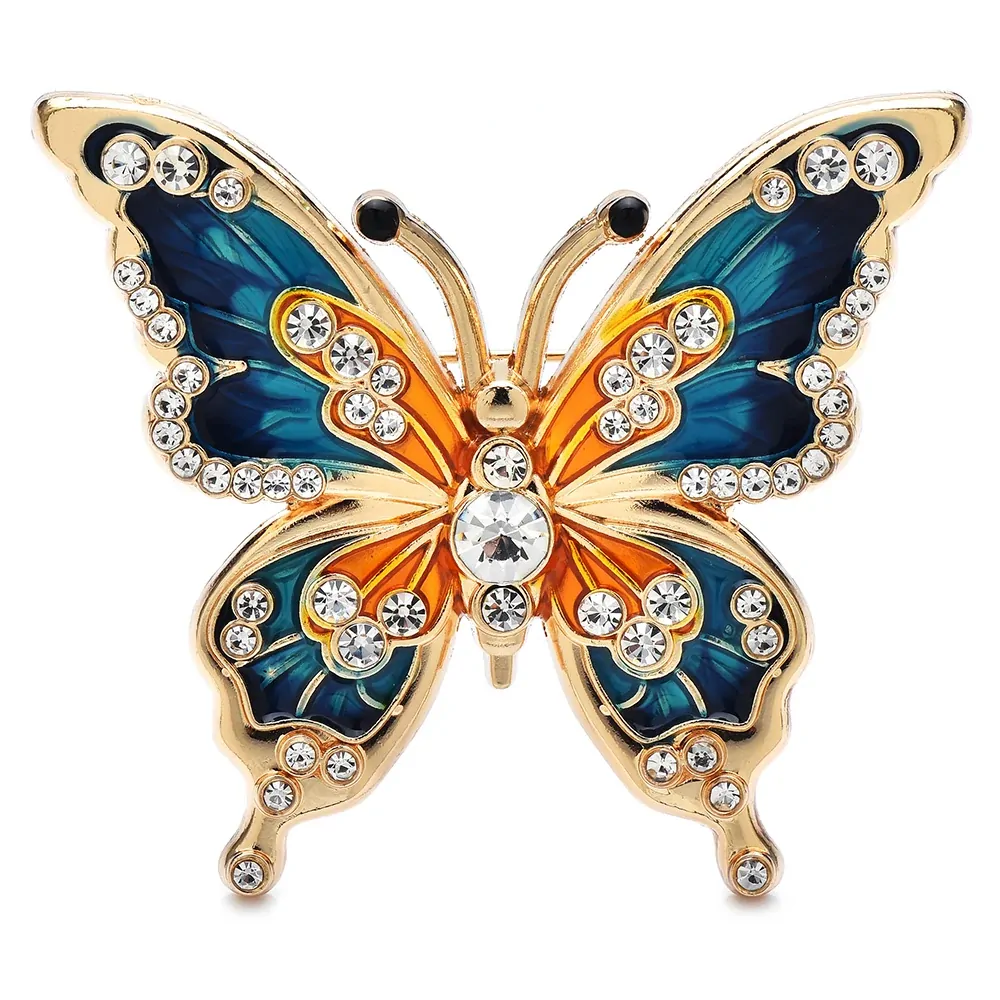 Broche papillon strass bleu et orange, ailes en émail bordées de strass et cristal central