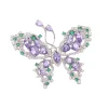 Broche papillon violette ornée de pierres taillées et strass sur monture argentée
