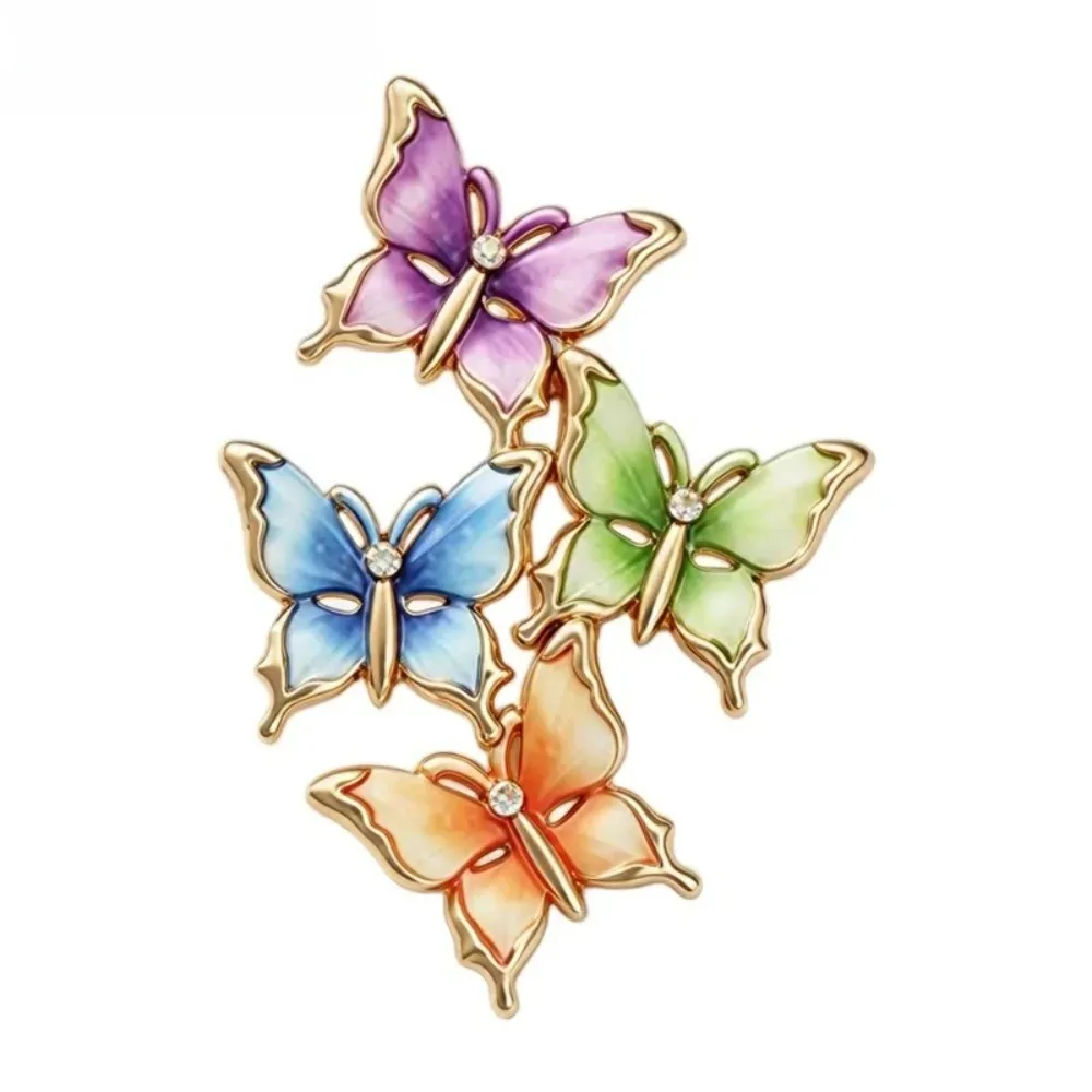 Broche papillons en grappe pastel, quatre papillons en émail et contour doré
