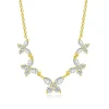 Collier guirlande de cinq papillons en zircons navette et ronds, plaqué or