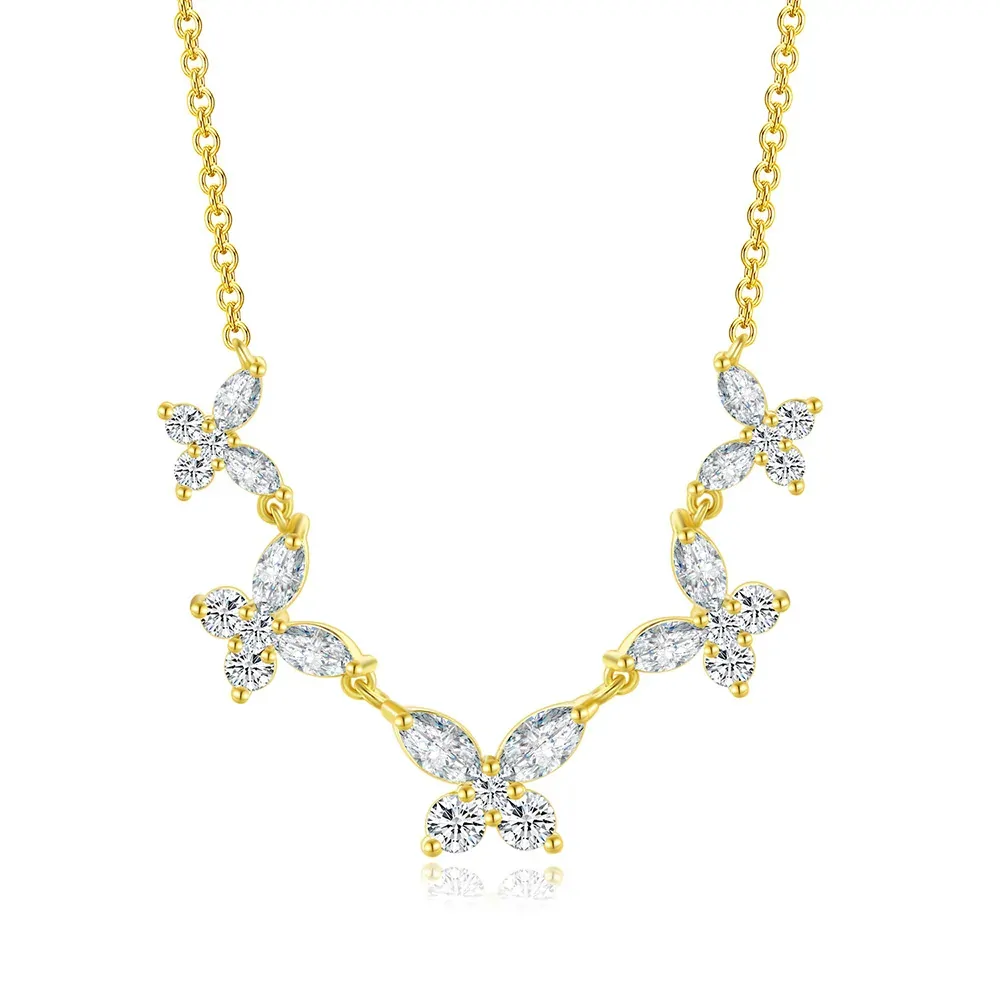 Collier guirlande de cinq papillons en zircons navette et ronds, plaqué or