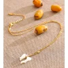 Collier nœud papillon en nacre naturelle et acier plaqué or, zircon rose central
