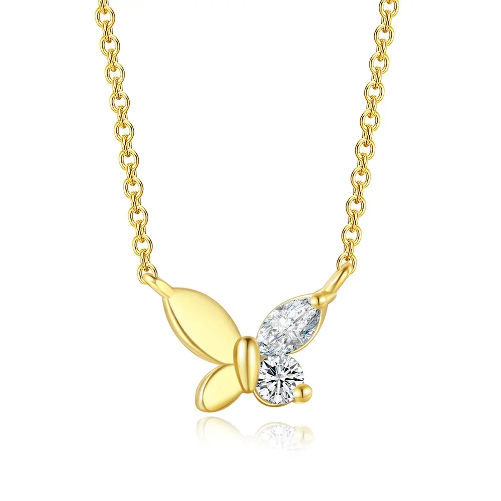 Collier papillon asymétrique plaqué or, ailes en métal poli d'un côté et zircons de l'autre