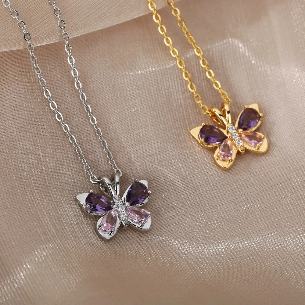 Les deux finitions du collier papillon cristal, argentée et dorée