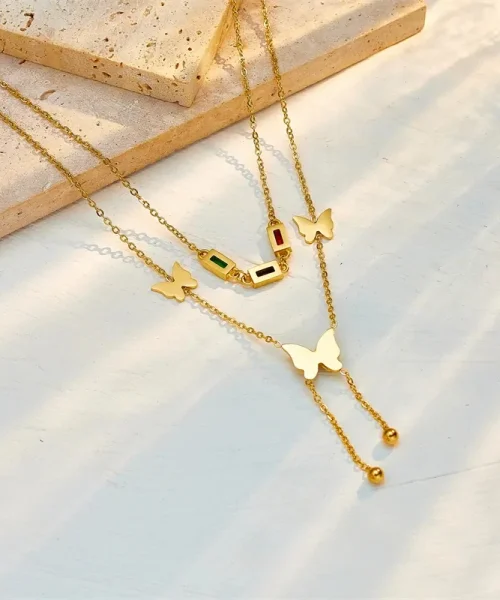 Collier papillon double rang doré en acier inoxydable, zircons colorés et pampille papillon