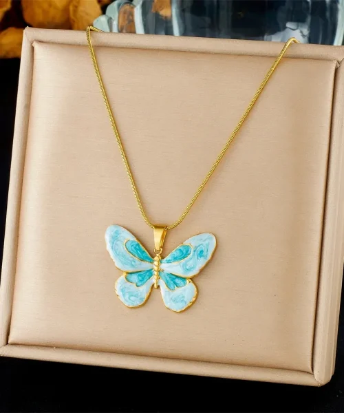 Collier papillon en émail bleu aquarelle sur acier inoxydable doré