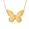 Collier papillon monarque doré, nervures en relief et bordure de points sur les ailes