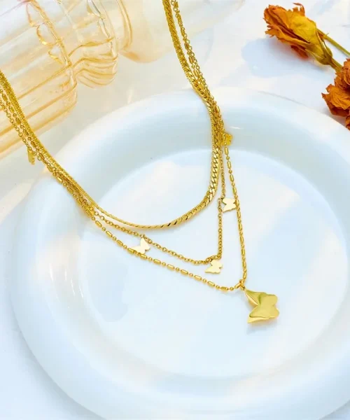 Collier papillon multirang doré en acier inoxydable, trois rangs superposés à papillons