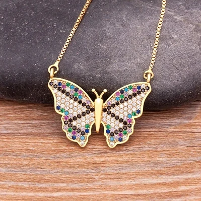 Collier Papillon Scintillant modèle Rayé Noir et Blanc, pavé de zircons blancs rayé de noir et de couleurs