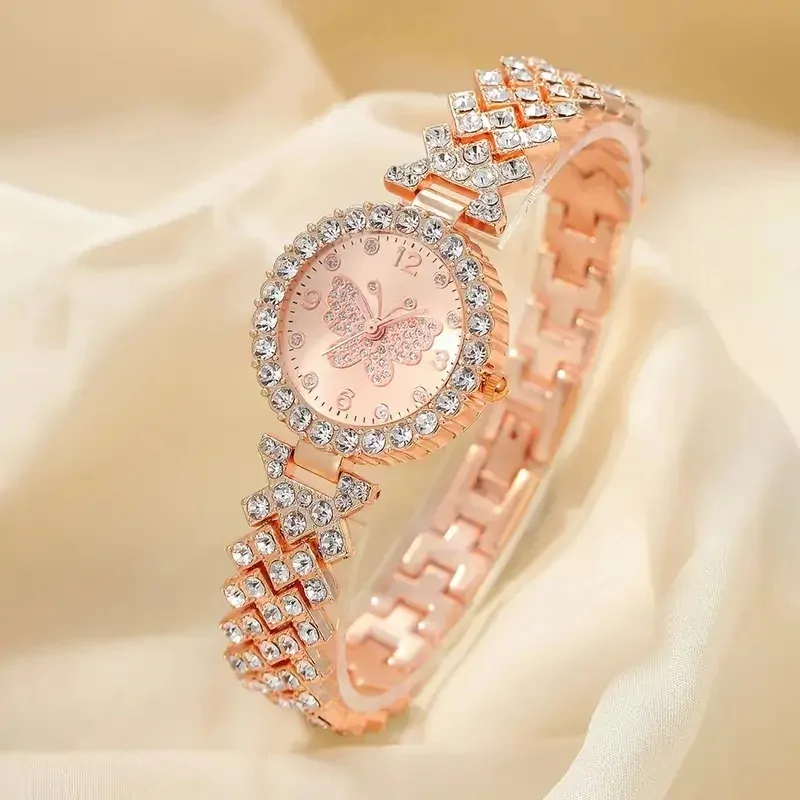 Montre papillon femme pavée de strass, cadran à papillon serti, or rose