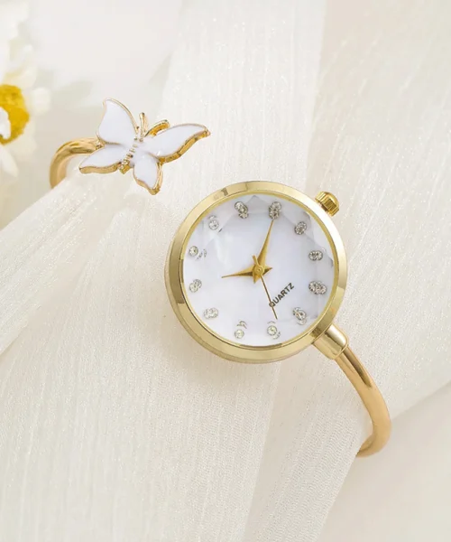 Montre jonc papillon femme finition dorée, cadran nacré et papillon blanc