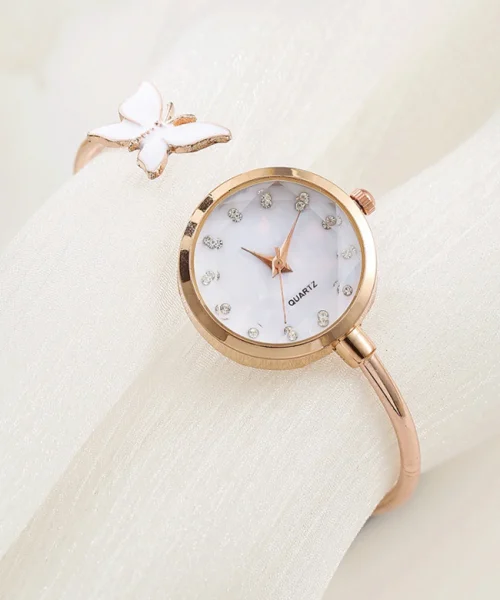 Montre jonc papillon femme finition or rose, cadran nacré et papillon blanc