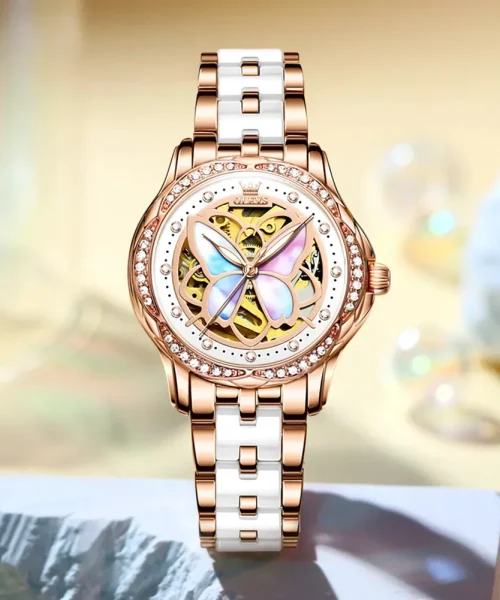 Montre papillon automatique femme, cadran squelette à papillon nacré et bracelet or rose et céramique
