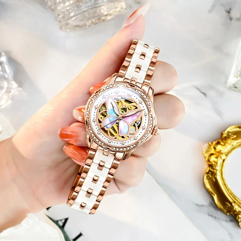 Montre papillon automatique femme, cadran squelette à papillon nacré et bracelet or rose et céramique