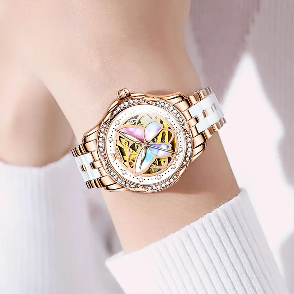 Montre papillon automatique femme, cadran squelette à papillon nacré et bracelet or rose et céramique