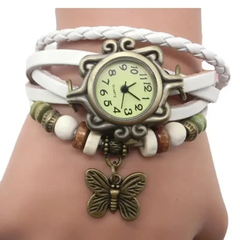Montre papillon bohème femme, bracelet cuir tressé blanc et breloque papillon bronze