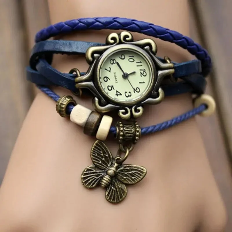 Montre papillon bohème femme, bracelet cuir tressé bleu et breloque papillon bronze