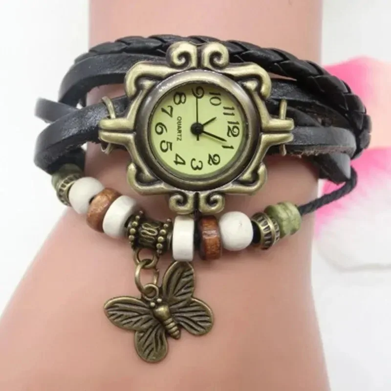 Montre papillon bohème femme, bracelet cuir tressé noir et breloque papillon bronze