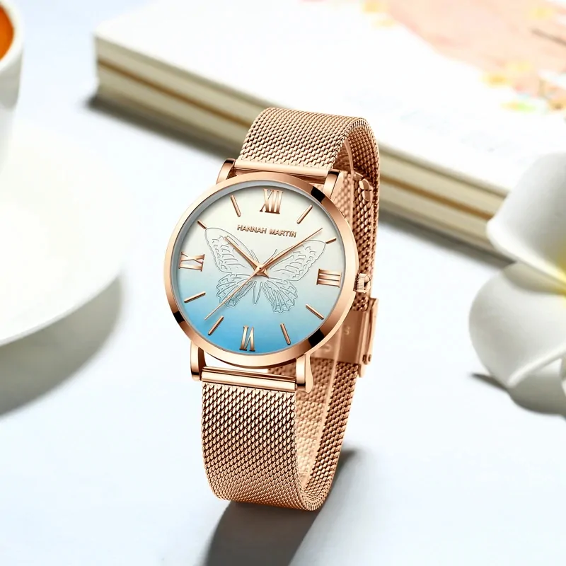 Montre papillon or rose femme, maille milanaise acier et cadran bleu à papillon gravé