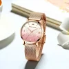 Montre papillon or rose femme, maille milanaise acier et cadran rose à papillon gravé