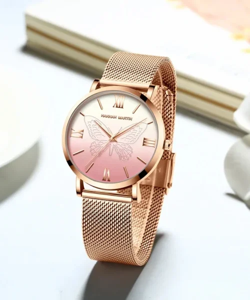 Montre papillon or rose femme, maille milanaise acier et cadran rose à papillon gravé