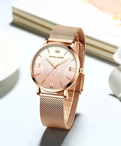 Montre papillon or rose femme, maille milanaise acier et cadran rose-dore à papillon gravé